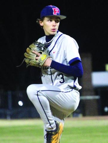 Putnam County’s Trace Watkins (3) in the wind-up, getting ready to deliver a pitch during a scrimmage against Jones County earlier this month. BRAD HARRISON/Staff
