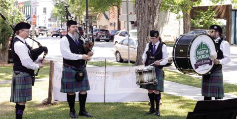 Bagpipers and drummers play outside as attendees arrive to First Presbyterian Church in Greensboro for Scottish Heritage Day. LEIGH LOFGREN/Staff