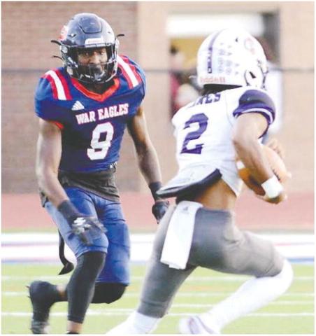 Kaleb Crawford (9) chases a ball carrier in a game earlier this season. IAN TOCHER/Staff
