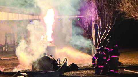 The fire burns off the gas leaking from the propane tank. CONTRIBUTED