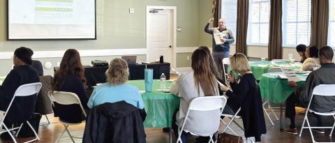 Kirk O’Brien, evaluation consultant with Georgia Family Connection Partnership, discusses the main three indicators that concern the Collaborative’s mission to aid families and children in Putnam County. EMME CLAUSE/Staff