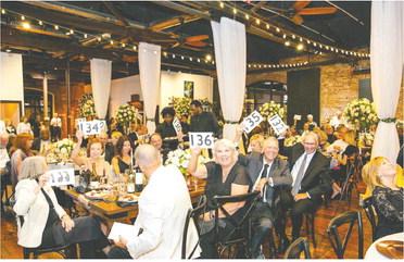 Attendees enjoy the festivities at the Soirée Blanc and Noir fundraiser. CONTRIBUTED