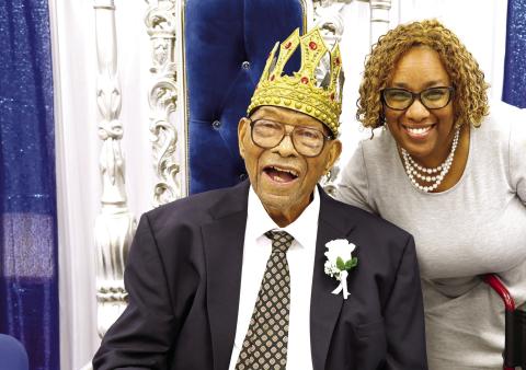 William Gilbert enjoys the celebration of his career as an educator in Putnam County. T. MICHAEL STONE/Staff