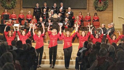 The ladies of the chorus perform a dance choreographed by Maureen Brower and Charlotte Mosteller during “A Tinseltown Christmas.” LEIGH LOFGREN/Staff