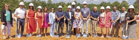 St. Mary’s and community leaders pose for a photo to celebrate breaking ground for the St. Mary’s Good Samaritan Pavilion. LEIGH LOFGREN/Staff