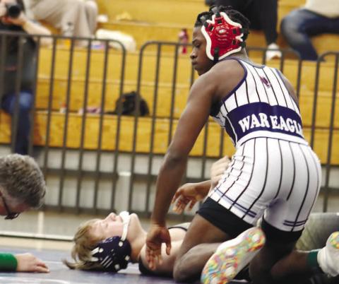 Senior Brayon Farley with crucial pin for the War Eagles, sending the state match to a tiebreaking decision.