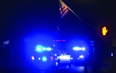 Blue lights illuminated downtown Eatonton Thursday night after a vehicle was observed driving the wrong way. IAN TOCHER/Staff