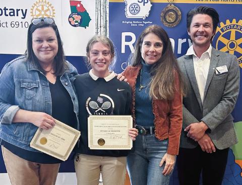 Lake Oconee Academy October student of the month Anika Imhof (center) with Caroline St. John (left), Elvia Imhof, and Rotarian Dr. Tyler Franks. CONTRIBUTED