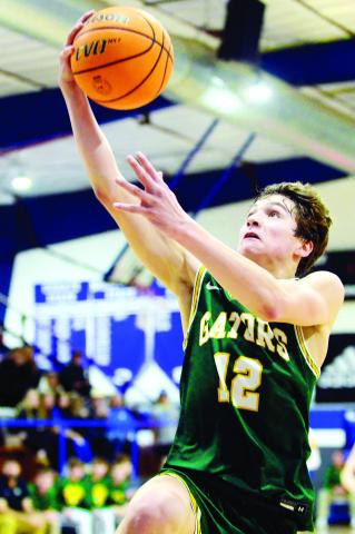 Gatewood’s Matt Allen goes up for two points in the Gator’s 84-52 win at Piedmont Academy in Monticello last Friday. Allen finished the night with 47 points to his credit. IAN TOCHER/Staff