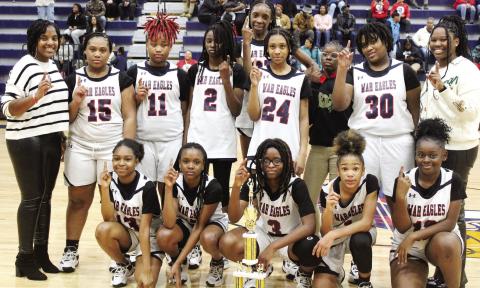 Head coach Sha’Kedra Ellison has her Putnam County Middle School girls at the top of their game, as they combined recently to win the team’s third-consecutive conference championship. KIM CASH/Staff