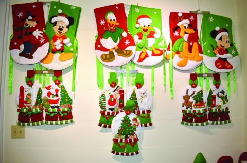 Carmenza Moreno contributed a collection of stitched artwork featuring Mickey Mouse and gang in winter attire. BAILEY BALLARD/Staff
