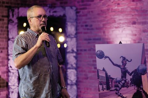 In a presentation at Barrel 118 on Friday night, Kevin Tomson-Hooper introduced four new artworks to the Eatonton Sculpture Trail, including “Delicate Balance,” which has been installed outside The Artisans Village Gallery on West Marion Street. IAN TOCHER/Staff