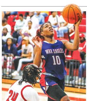 Putnam County’s Journey Waller (10) goes up for a layup in a win over Social Circle on Feb. 4. The Lady War Eagles will rely on the sophomore and leading scorer as they prepare for the Class A Division I playoffs, which begins next week. LANCE MCCURLEY/Staff