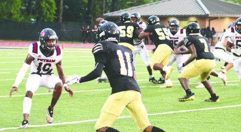Putnam County cornerback Cory Foster (10) in coverage of former Greene County wide receiver Jaden Dorsey (11). BRENDAN KOERNER/Staff