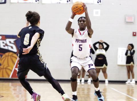 Junior Jaylin Harper (5) has played a key role in the War Eagles’ success this year. He scored 19 points in the loss to Veterans last week. LANCE MCCURLEY/Staff