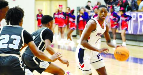 Eren Banks (1) controls the tempo of the game and cuts through Glenn Hills defense. ARELLA CASH/Staff