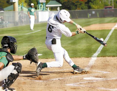 Gatewood’s Hunter Johnson connects at the plate in a game played earlier this season in Eatonton. TREY NORRIS/Staff