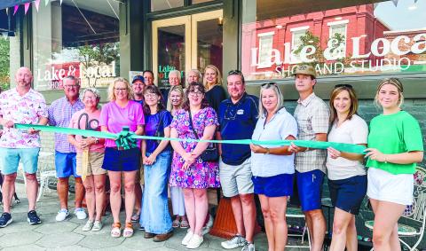 Lake &amp; Local cut the ribbon to their new location alongside Chamber of Commerce members The Palms on Main and The Boat Shop. CONTRIBUTED