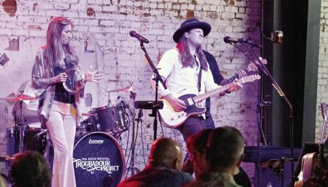 Troubadour Project vocalists Jessie Albright and Jim Stapley on stage Saturday. (LEIGH LOFGREN/Staff)