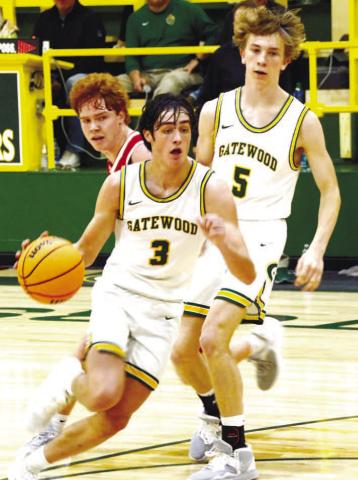 Gatewood sophomore Walker Roberts (3) makes a strong offensive move with the ball as his Gators teammate, Blake Callaway, follows the play. IAN TOCHER/Staff