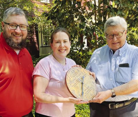 Eatonton’s Jim Marshall (right) accepted a commemorative wall clock upon retiring after more than 40 years as a board member for the Georgia Association for Volunteer Administration. CONTRIBUTED