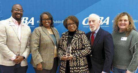 Putnam County Charter School System board members, including (l-r) Charles Trumbo, Simone Jones, Doris Clemons, Chairman Steve Weiner, and Vice Chair Carol Ann Guthrie display their 2025 Exemplary Board Recognition from the Georgia School Boards Association. CONTRIBUTED