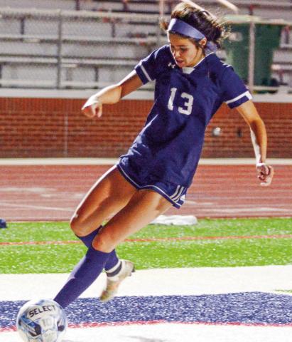 Alongside teammates Gracie Bird and Elizabeth Haley, Lily Frisch (13) is part of a three-pronged attack for the PCHS girls' soccer team. IAN TOCHER/Staff