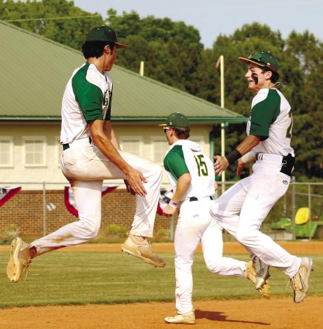 A high-flying Walker Roberts (3) and Tanner Johnson (24) celebrate advancing to the state playoffs after ousting TREY NORRIS/Staff