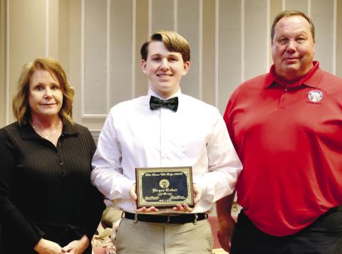 Amey and Scott Montgomery presented Brice Coker from Gatewood Schools with the Lake Oconee Elks Lodge Most Valuable Student Scholarship. CONTRIBUTED