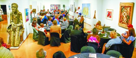 Literally surrounded by the artist’s work, patrons gathered to honor his wife, Sara Douglass Thomas, during Founder’s Day at the Steffen Thomas Museum of Art in Buckhead. 