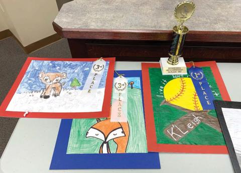 L-R: Primary school winners first-grader Kinslie Brundage, first-grader Raina Caxwell, and second-grader K’Leigh Jones. BAILEY BALLARD/Staff