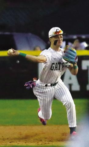 Gatewood senior Ames Johnson tries to make a force out at first base after making a play on an infield ground ball. TREY NORRIS/Contributed