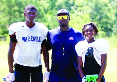 From L to R: Bryson Brown, Kedric Manning, and Jacob Manning. LANCE McCURLEY/Staff