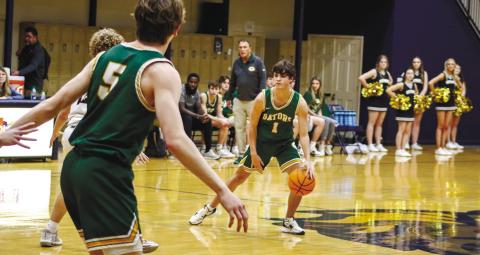 Jackson Morris (1) dribbles the ball at the top of the key in the loss to Westminster Christian last Tuesday. LANCE McCURLEY/Staff