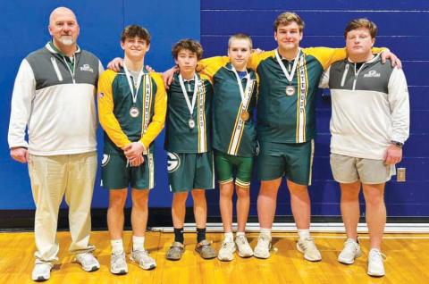 Gatewood wrestling head coach Tyler VanDusen (left) is understandably proud of the accomplishments of his state championshipcontending team of Jackson Hewatt, Huck McLaulin, Hunter Pierce, and Tyler Middleton. CONTRIBUTED