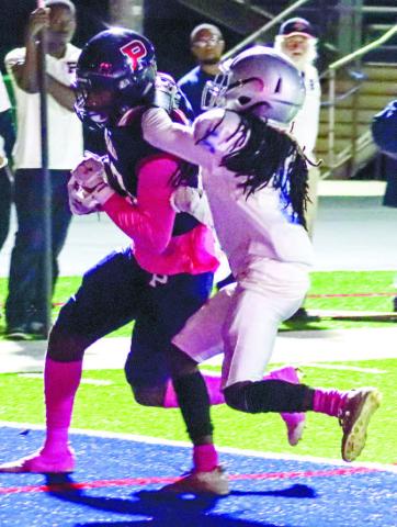Kilgore (23) shakes off a defender after he prances into the end zone for an eightyard TD. LANCE McCURLEY/Staff