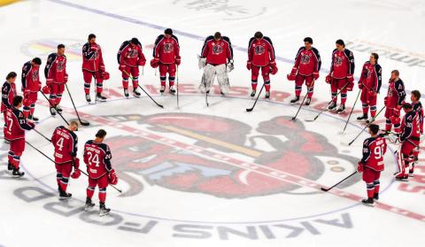 Before the Rock Lobsters’ home opener Oct. 25, the team observed a moment of silence in honor of Orca Wiesblatt, a teammate killed one month earlier in a car accident in Canada. IAN TOCHER/Staff