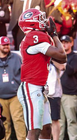 Georgia freshman running back Nate Frazier (3) carried the ball 21 times for 136 yards and three scores against the Massachusetts Minutemen. JIM TURNER/Contributed