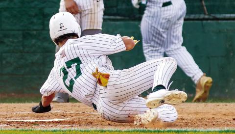Jackson Hewatt (27) reaches for home plate to score for Gatewood against Westwood last Friday evening. TREY NORRIS/Staff