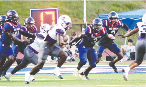 Putnam County junior Rashod Daniel (3) closes in on a Jasper County ball carrier in a win on Sept. 8. IAN TOCHER/Staff