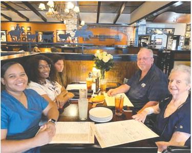 Joining Peaceful Purpose Hospice patient Beatrice Towers at Longhorn Steakhouse was her son Johnny Meeks (right) sitting opposite of Ms. Towers’ granddaughter, PPH social worker Brandiss Marks, and Porsha Smith of PPH (left front). CONTRIBUTED