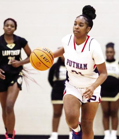 Senior Kamyra Aikens (25) is the team’s leading scorer. LANCE MCCURLEY/Staff