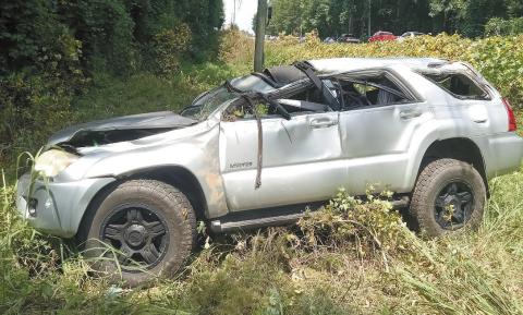 Traffic on Pea Ridge Road was delayed as Putnam County’s emergency personnel handled the single-vehicle crash involving this 4-Runner Saturday. CONTRIBUTED/PCSO