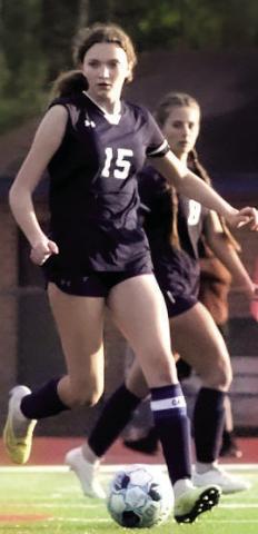 Gracie Bird (15) pushes the ball up the field against Butler last Wednesday. TREY NORRIS/Staff