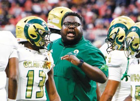 Damoio’n Wright helped Grayson win the Class 6A state championship over Carrollton on Dec. 18. LANCE McCURLEY/Staff