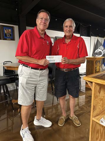 On Aug. 18, Lake Oconee Elks Lodge President Chuck Brake (left) presented a $3,500 check to Putnam Christian Outreach Director Rex Corlett for PCO’s use to help feed local citizens. CONTRIBUTED
