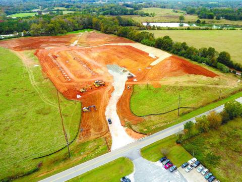 A drone photo shows site work in the beginning phases for Frey-Moss Structures, which is expected to build a 100,000-square-foot facility. MARK ENGEL/Staff