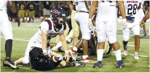 Seth Boyer makes a big-time hit against on Greene County running back Malik West.