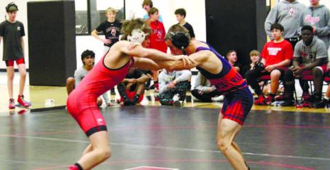 Sammy Ford locks up with an opponent before pinning his Morgan counterpart. ARELLA CASH/ Staff