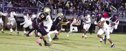 Putnam County quarter Branan Griffin (8) drops back to pass as he tries to find an open War Eagles’ receiver. ARELLA CASH/Staff